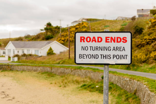 istock Sign on a coastal road which reads 