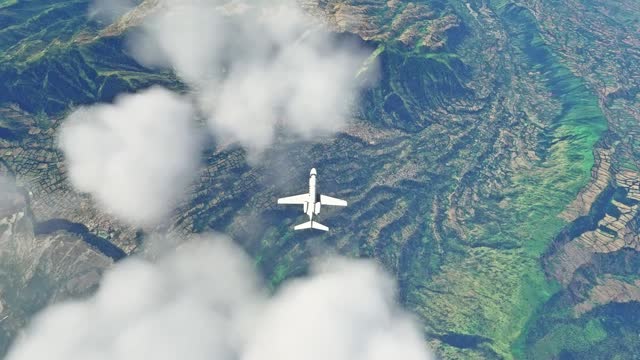 Private jet flying above mountains and clouds