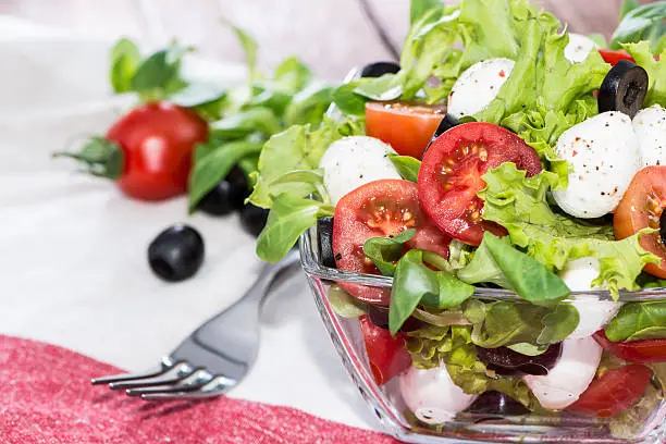 Bowl with fresh and healthy Tomato-Mozzarella Salad