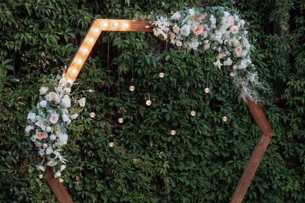 istock Wooden arch with flowers and lights 1787378520