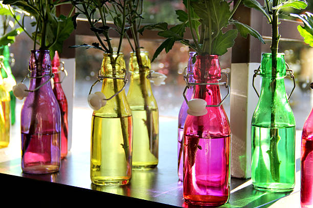 istock Flowers in the vivid bottles 178738634
