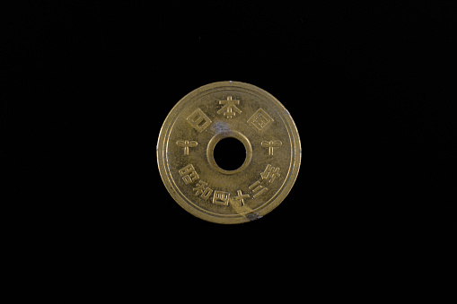 5 yen brass coin issued in 1968, old design with hole