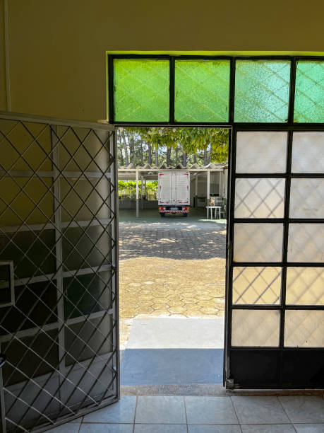 istock Open doorway leading to backyard 1787386415