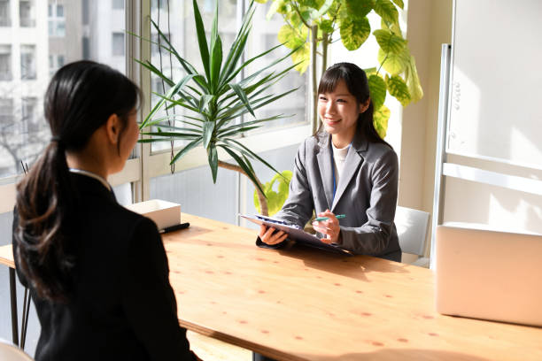 istock Female student being interviewed by an Asian female interviewer in the office 1787391665