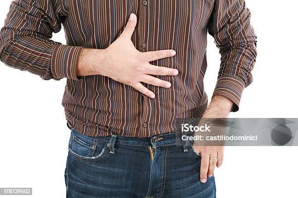 Man Holding His Stomach In Pain Stock Photo - Download Image Now - Abdomen, Adult, Adults Only