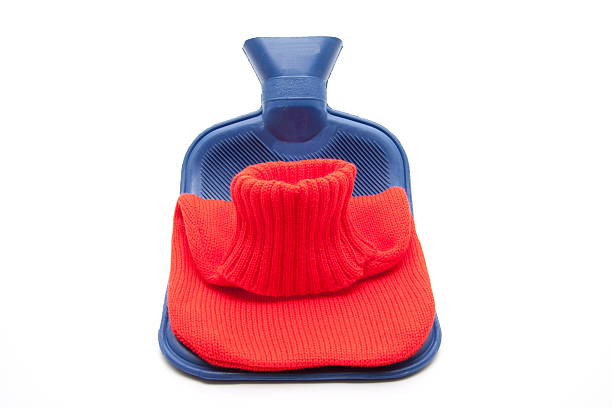 Warm bottle with red cover on white background