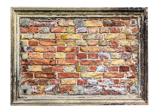 stuccoframe with old brickwall in it isolated on white.