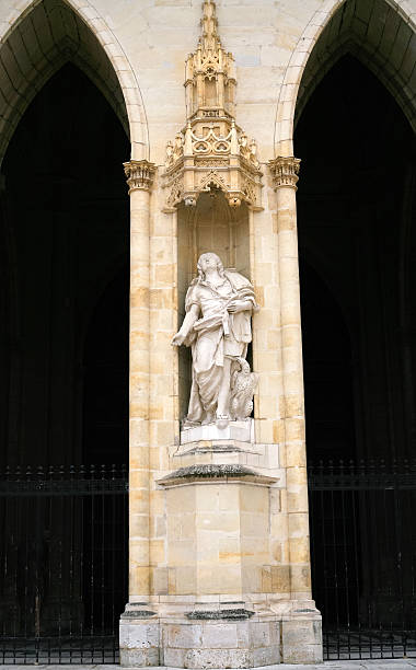 istock statue in wall of Orleans Cathedral 178740285