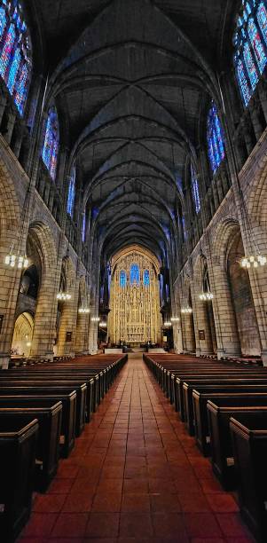 istock interior of an empty church with pews on either side 1787405438