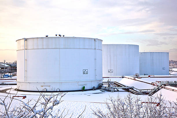 istock white tanks in tank farm with snow 178740989
