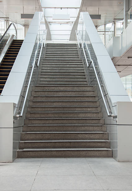 istock Stairway with handrails leading to upstair. 178741110