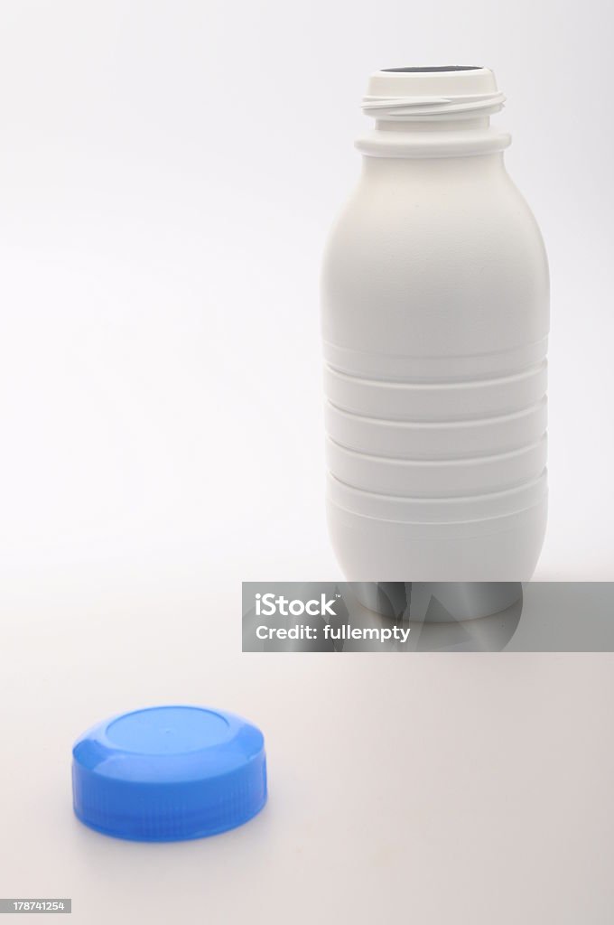 Plastic Milk bottle Plastic Milk white and blue cap bottle Blue Stock Photo