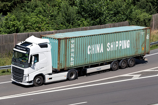 Wiehl, Germany - June 25, 2019: Volvo FH truck with China Shipping container on motorway