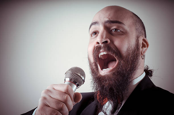 funny elegant singer bearded stock photo