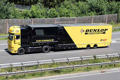 Wiehl, Germany - June 24, 2019: Dunlop Motorsport DAF truck on motorway
