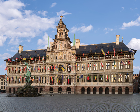 The City Hall of Antwerp, Belgium, stands on the western side of that city's Grote Markt (main square). Erected between 1561 and 1565, after designs made by Cornelis Floris de Vriendt and several other architects and artists, this Renaissance building incorporates both Flemish and Italian influences. The building is listed as one of the Belfries of Belgium and France, a UNESCO World Heritage Site.