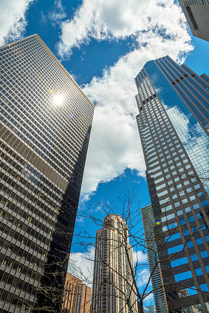 istock Chicago skyscrapers with clouds and sun reflection 178742125