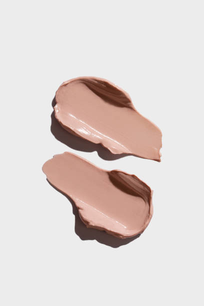 istock Cream texture cosmetic smear on white background. Make-up base. Skin toning cream. 1787422549