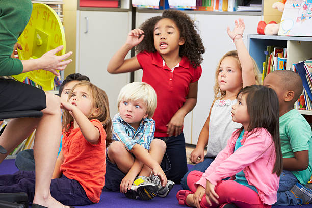 istock Elementary Pupils In Classroom Learning To Tell The Time 178742598