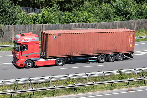 Wiehl, Germany - June 24, 2019: DAF truck with Florens container on motorway