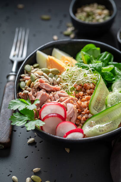 istock Fresh Nicoise salad with groats, eggs and tuna. 1787431573