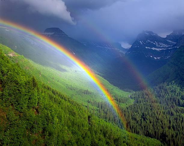 Double rainbow in Glacier National Park stock photo