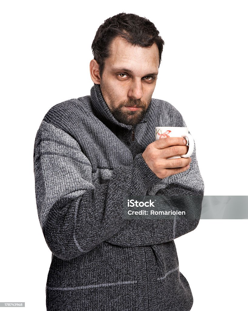 Hombre enfermo sosteniendo una taza de té en las manos - Foto de stock de Adulto libre de derechos