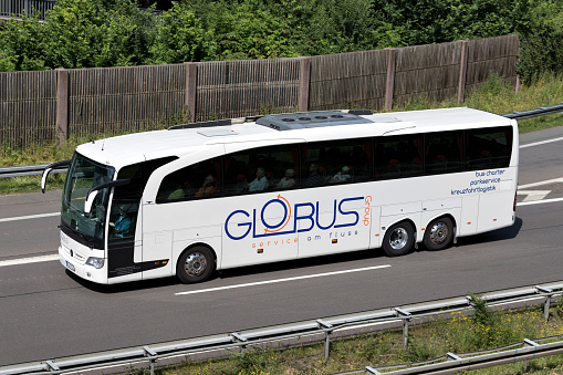 Wiehl, Germany - June 25, 2019: Globus Mercedes-Benz Travego intercity bus on motorway