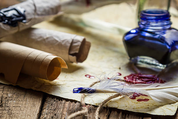 istock Old vintage desk full of scrolls scribe 178744481