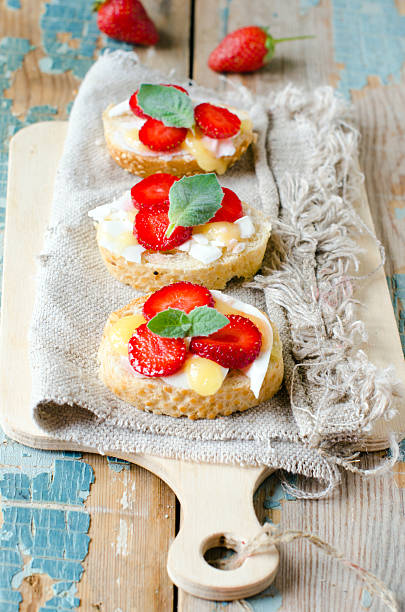 istock Bruschetta with cheese , honey and strawberries 178744824