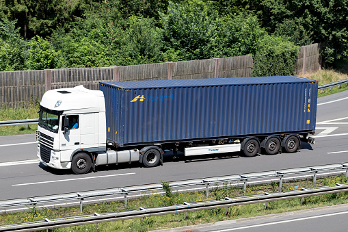 Wiehl, Germany - June 24, 2019: DAF XF truck with Honeytak container on motorway