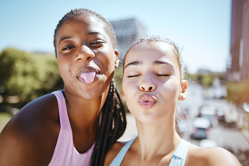 Selfie, fitness and city girl friends together training for healthy body, cardio and wellness outside. Love, friendship and sports exercise or athlete women take photo, workout outdoor in urban town