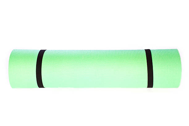 istock Lightweight foam Yoga Mat roll  on white 178745392
