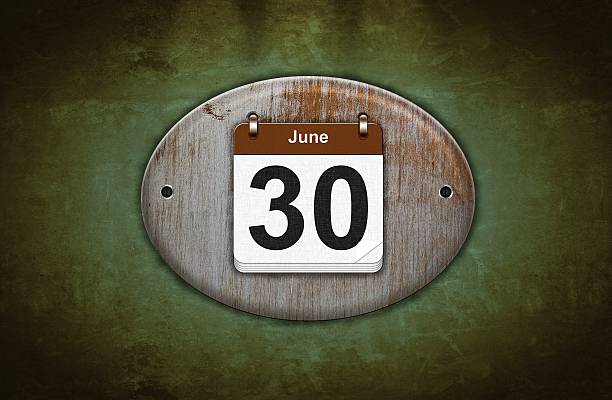 istock Old wooden calendar with June 30. 178745685