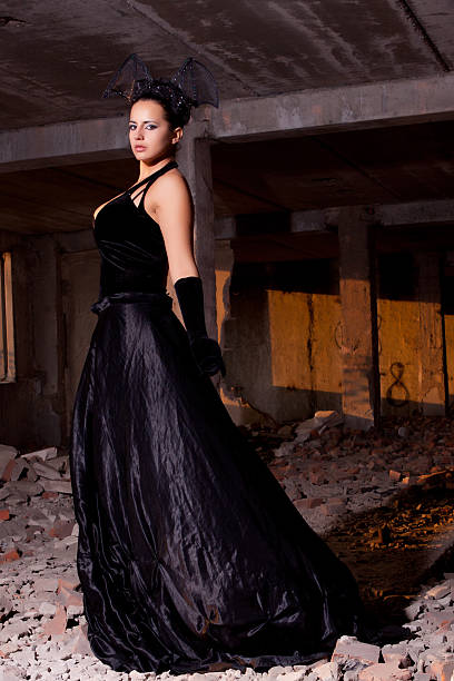 istock Young beautiful woman posing in ruins 178745830