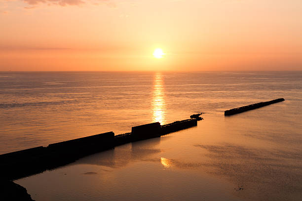 Sundown on Helgoland with wall into the sea
