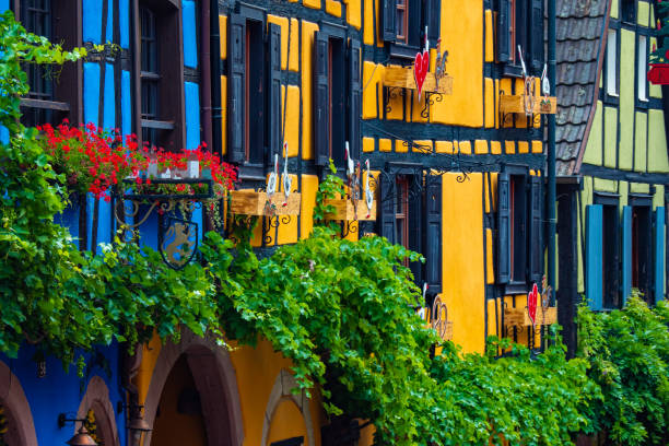 Colorful half timbered building in the streets of the beautiful Alsace village Riquewihr