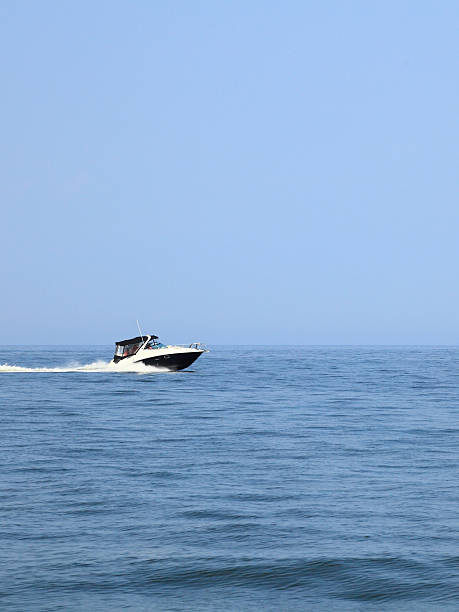 istock fast boat in blue sea view 178746318