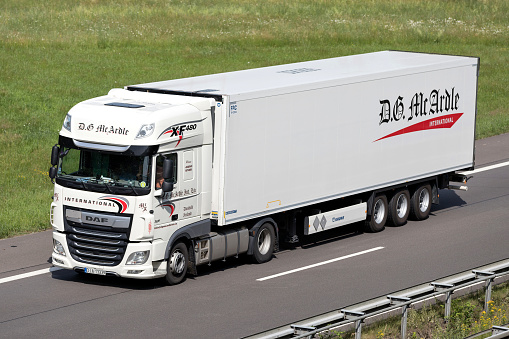 Wiehl, Germany - June 25, 2019: McArdle DAF XF truck with temperature controlled trailer on motorway