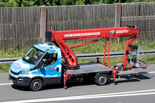Wiehl, Germany - June 24, 2019: Mobilift cherry picker van on motorway