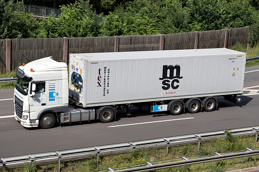 Wiehl, Germany - June 25, 2019: Kleijn Transport DAF XF truck with MSC container on motorway