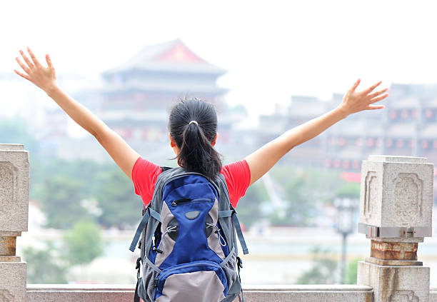 istock young asian woman open arms 178746727