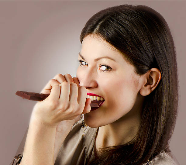 istock Young happy  woman with chocolate 178746737