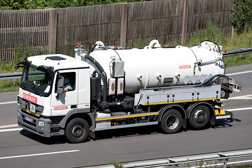 Wiehl, Germany - June 24, 2019: Remondis Mercedes-Benz Actros dustcart on motorway