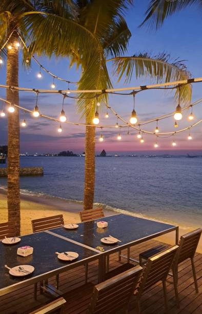istock Dining table by the sea in the evening 1787477864