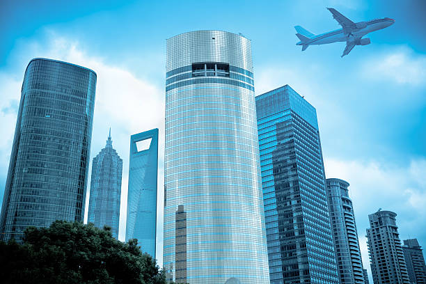 istock aircraft and modern city 178748288