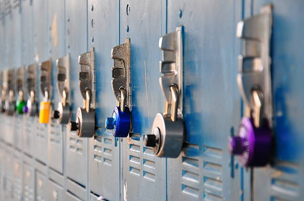 School lockers Colorful locks on a bank of school lockers junior high photos stock pictures, royalty-free photos & images
