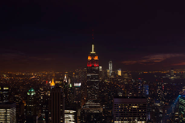 istock Illuminated Empire State and New York's skyline at night 178748693