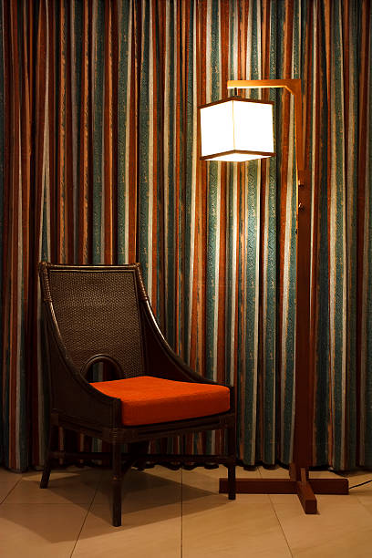 istock rattan chair with warm white lamp 178748927