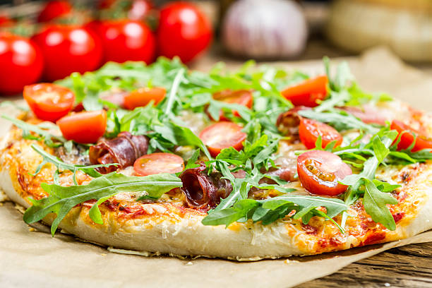 istock Closeup of pizza with parma ham 178749431